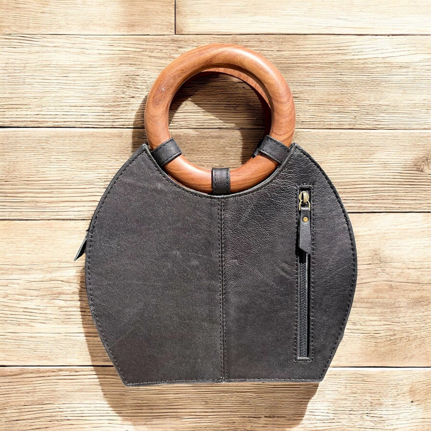 Large black floral tooled leather handbag