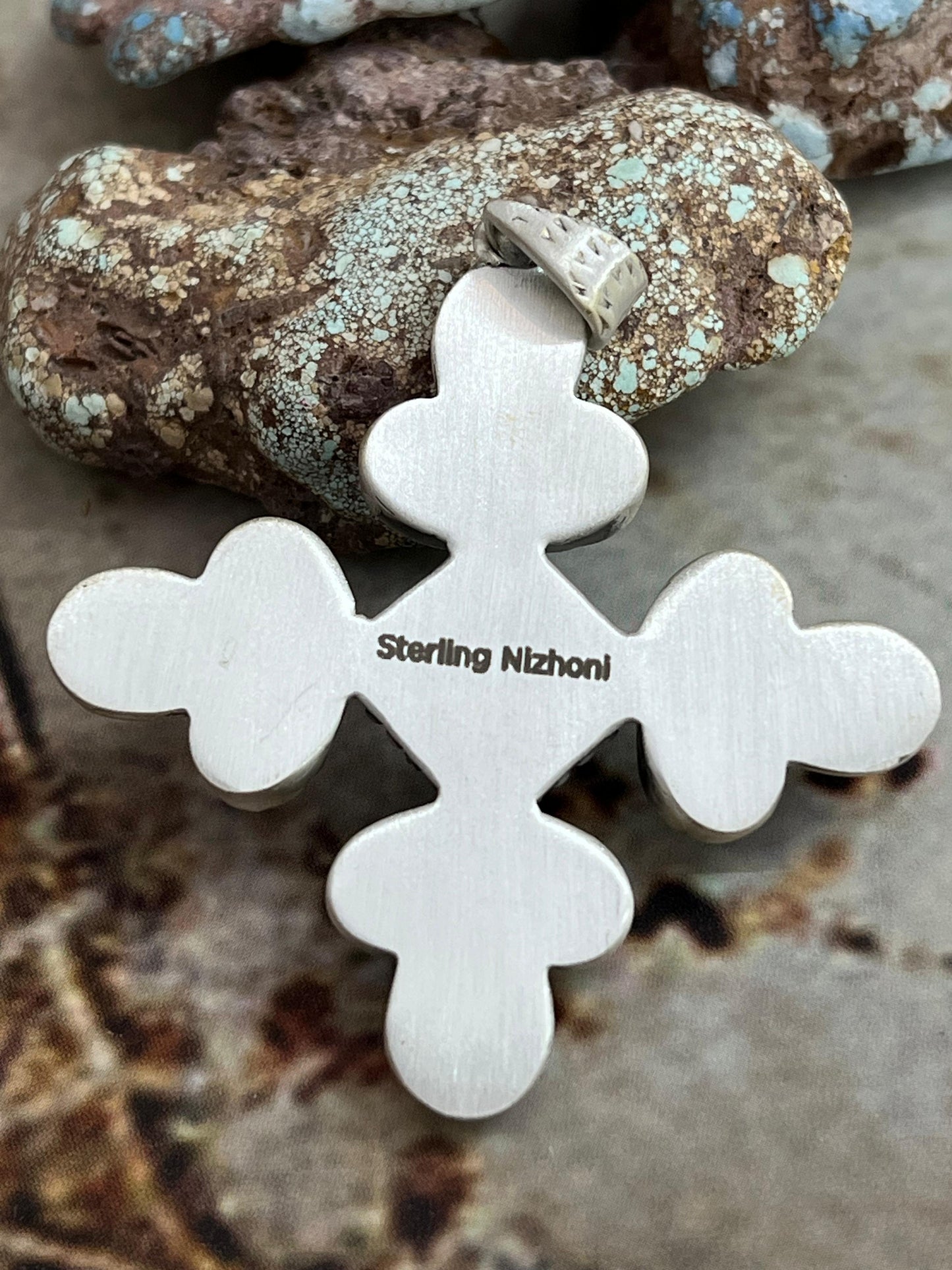 Handmade Sterling Silver White Buffalo Pendant with Signed Nizhoni