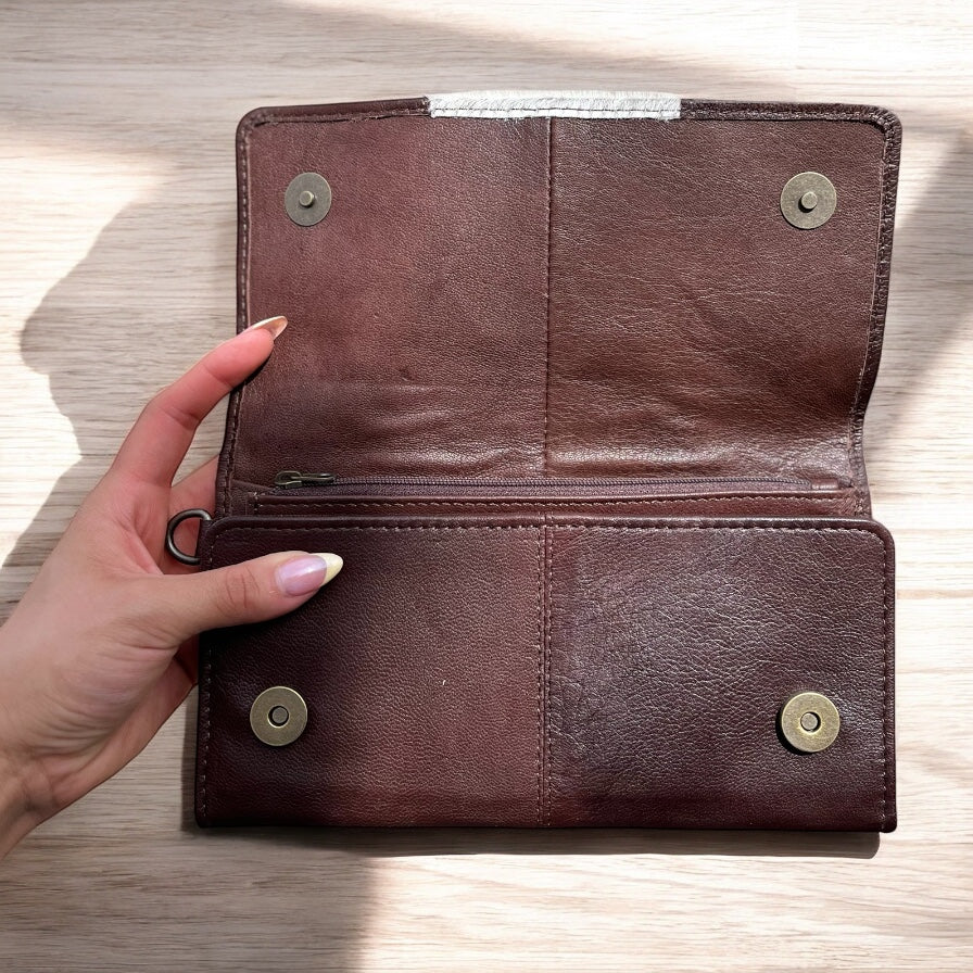 Brown cowhide wristlet