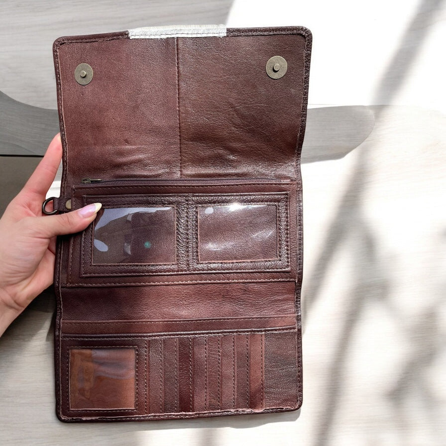 Brown cowhide wristlet