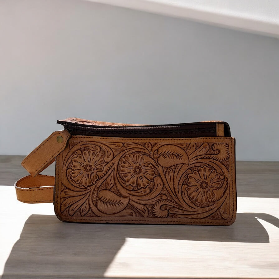 Tan hand tooled toiletry bag