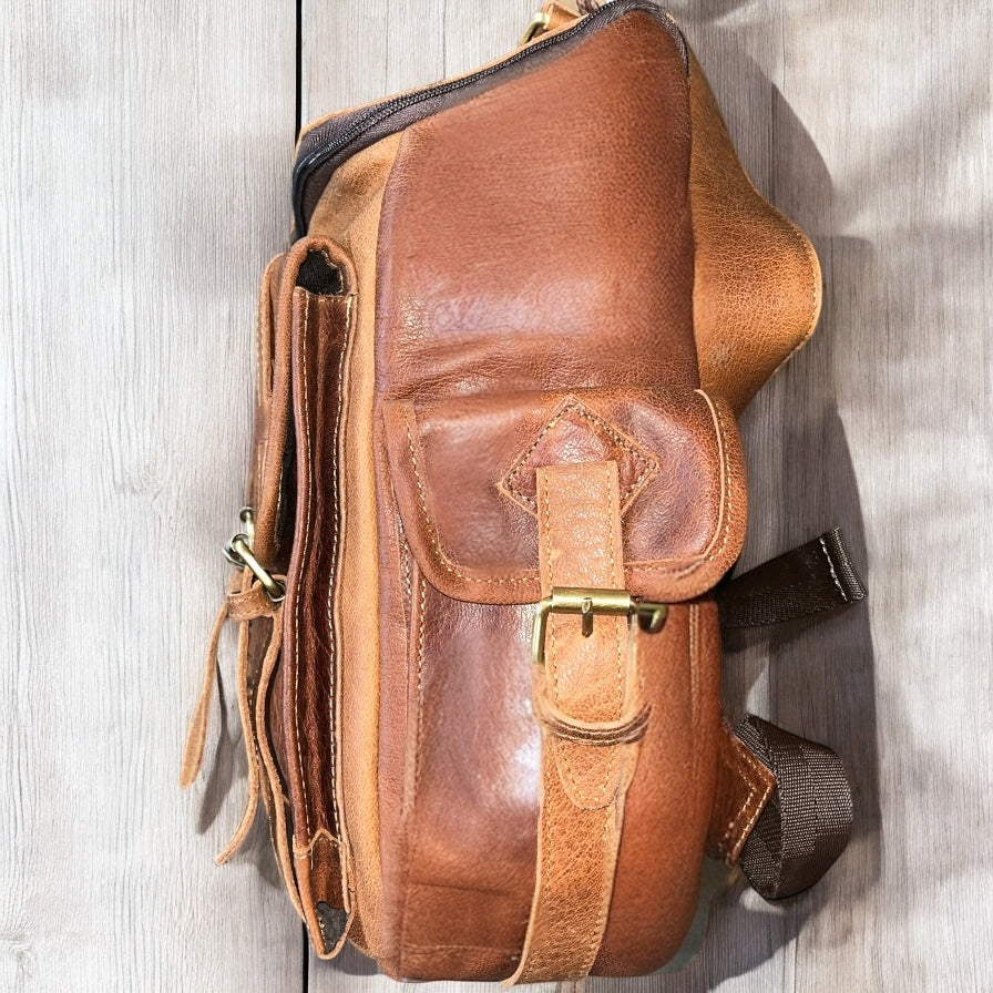 Tan rustic leather backpack
