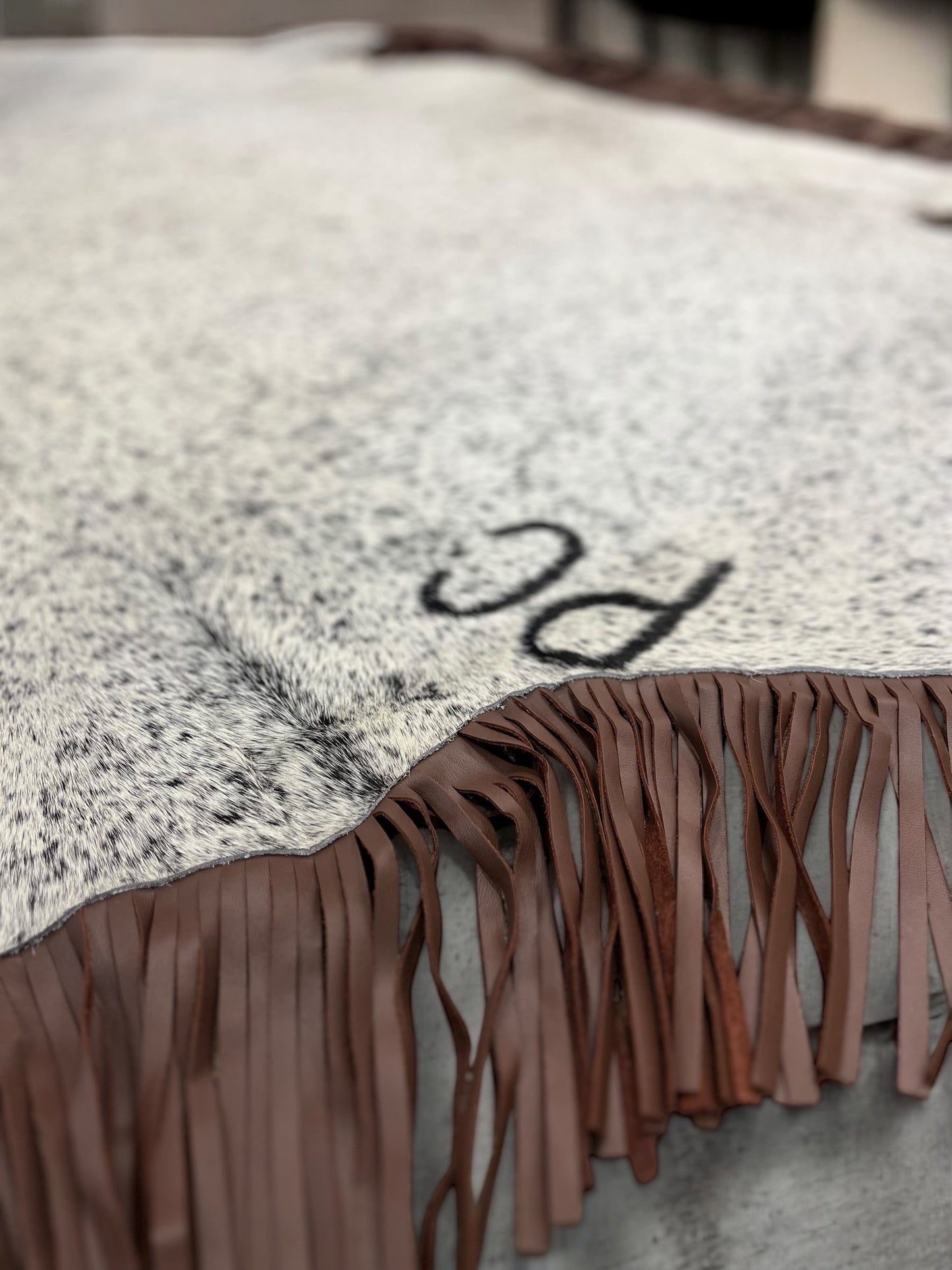 Brown Fringe Cowhide Rug