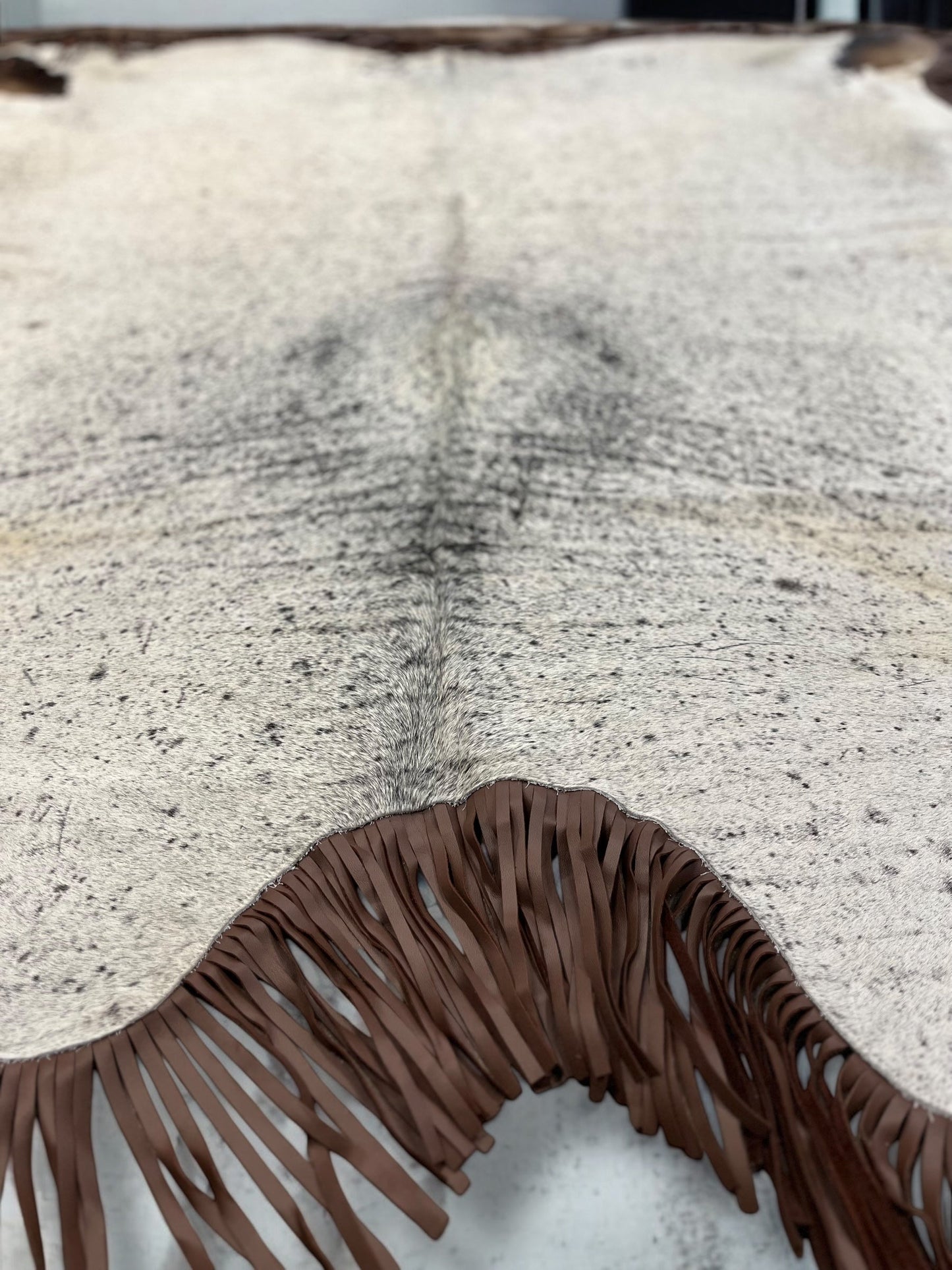 Brown Fringe Cowhide Rug