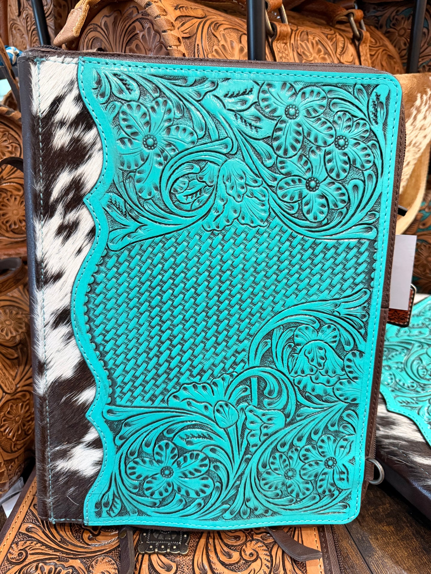 Handcrafted turquoise tooled leather and hair-on cowhide portfolio/binder