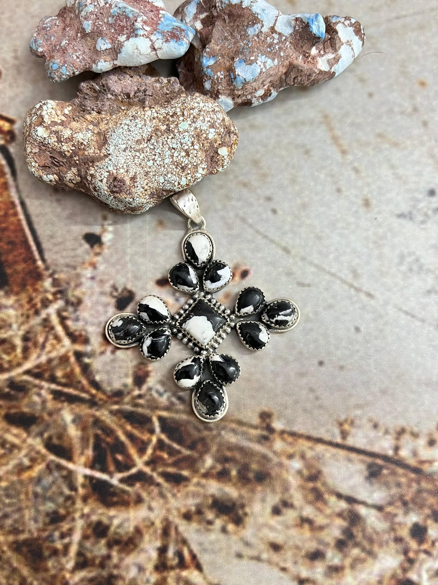 Handmade Sterling Silver White Buffalo Pendant with Signed Nizhoni