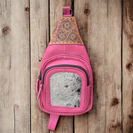 Pink cowhide/tooled sling bag