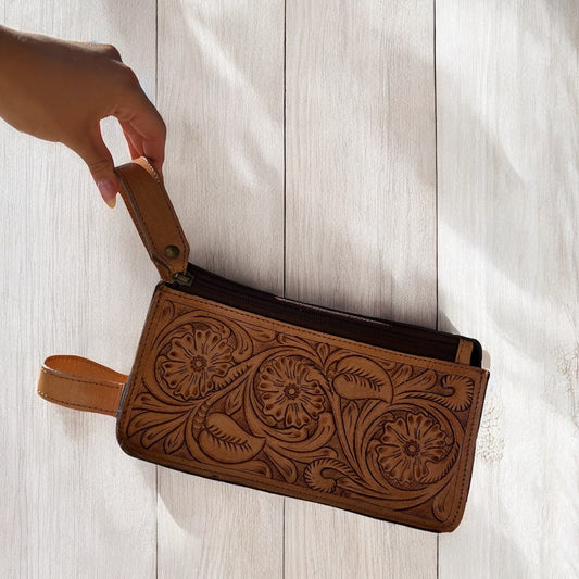 Tan hand tooled toiletry bag