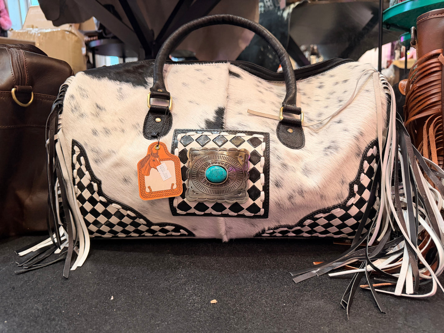 TOOLED LEATHER & COWHIDE DUFFLE BAG