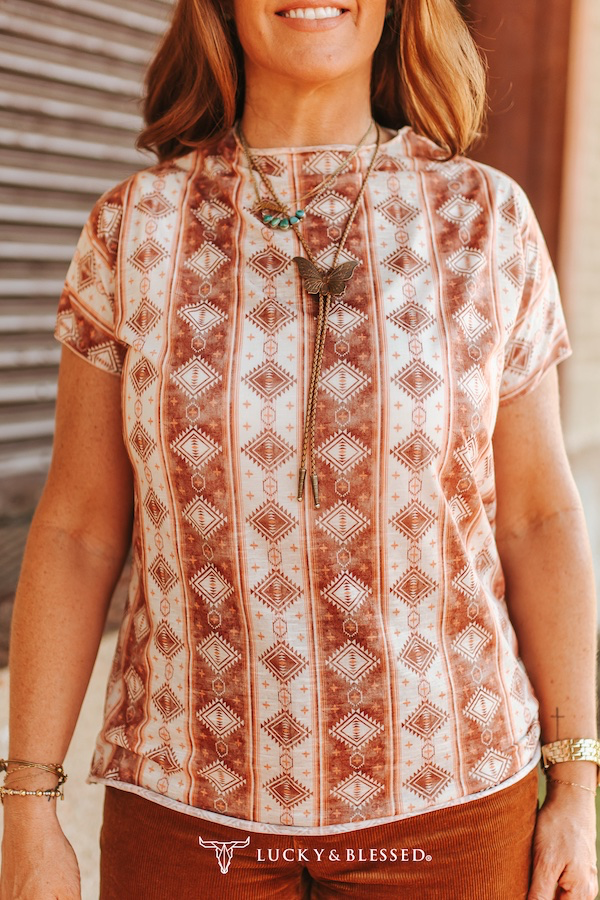 Rust Ivory Aztec Print Short Sleeve Tee from Lucky & Blessed’s Fall 2025 Collection