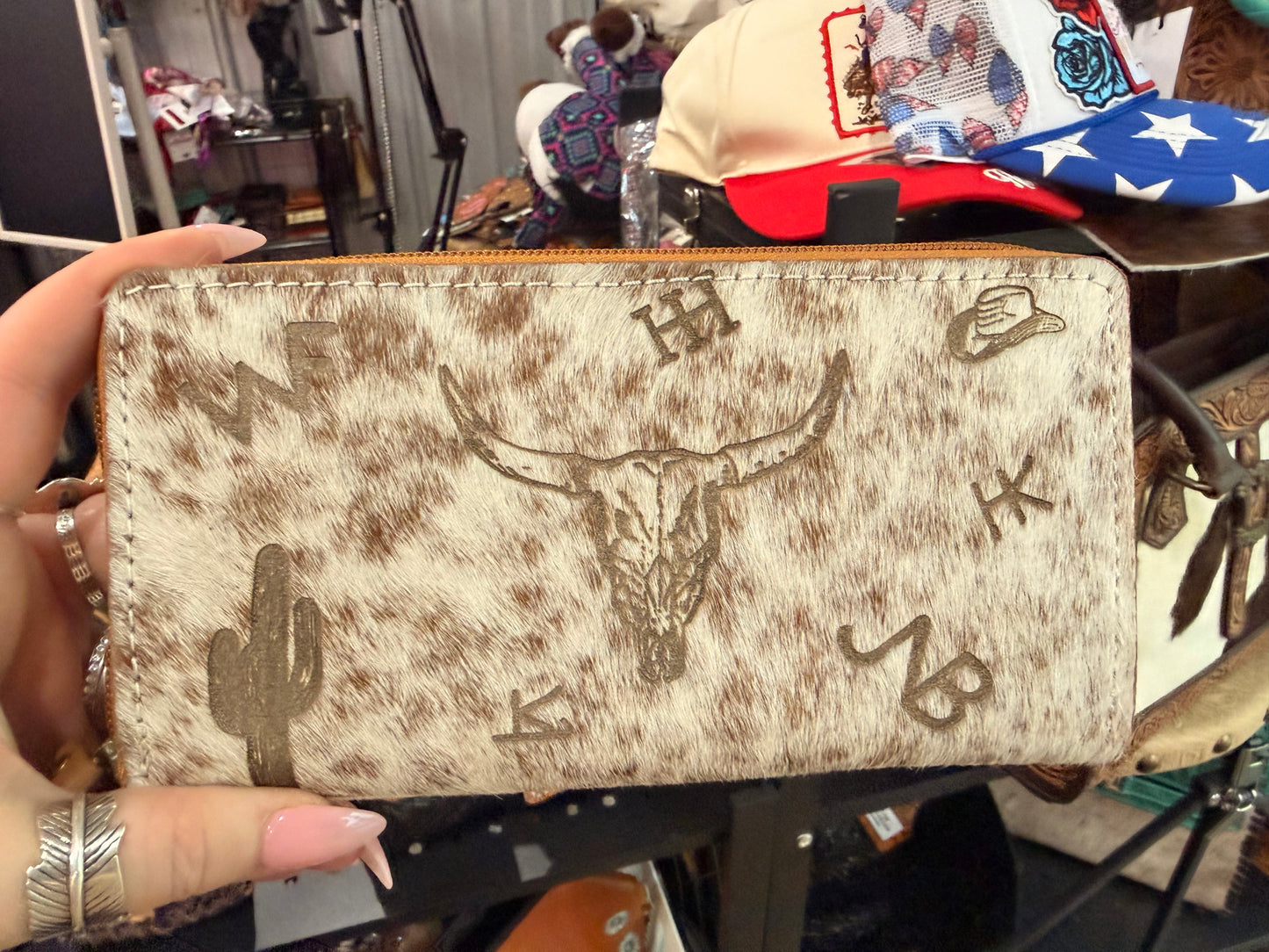 Brown and White Branded Cowhide Wallet