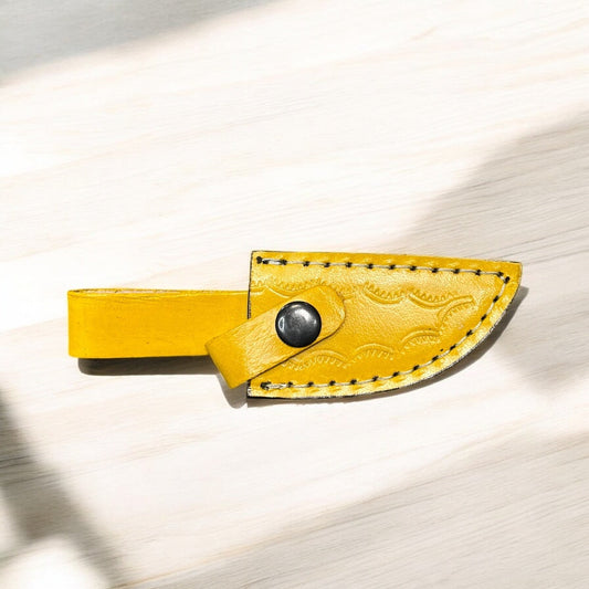 Yellow tooled leather sheath