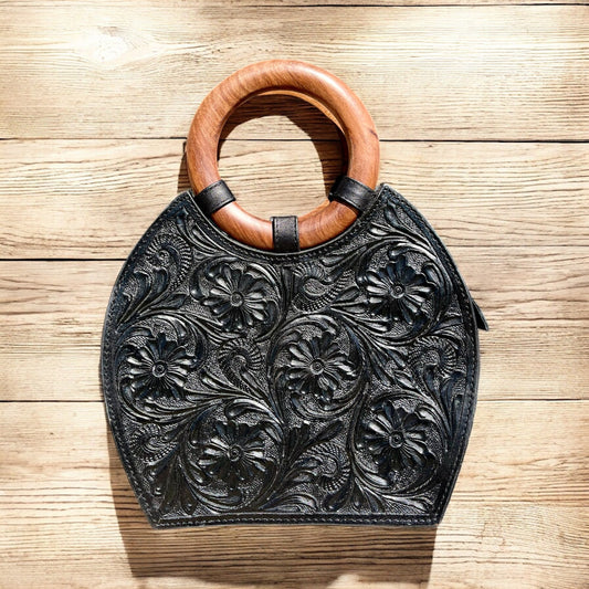 Large black floral tooled leather handbag