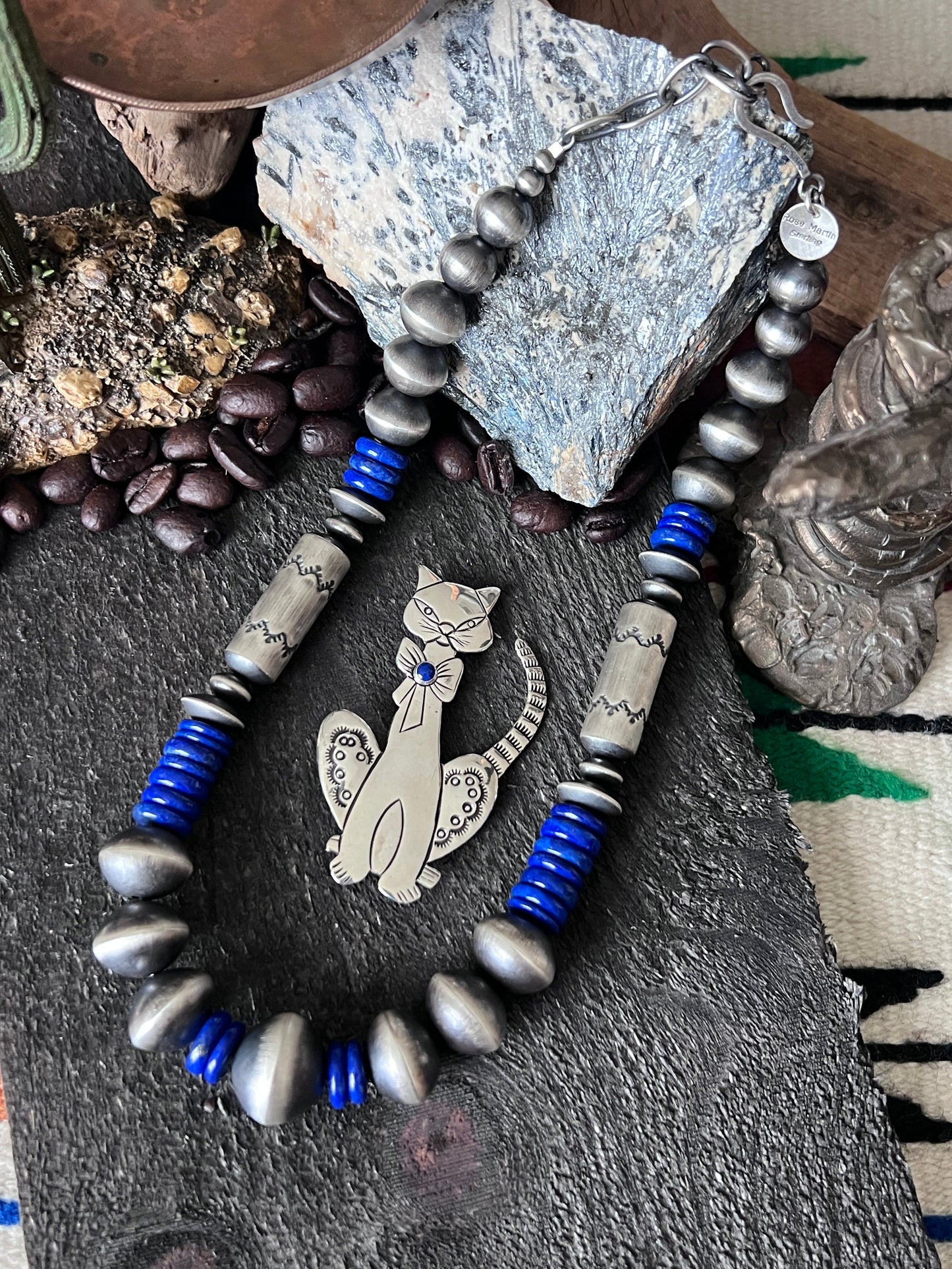 Hand Stamped Sterling Silver and Lapis Cat Brooch by Raymond Coriz