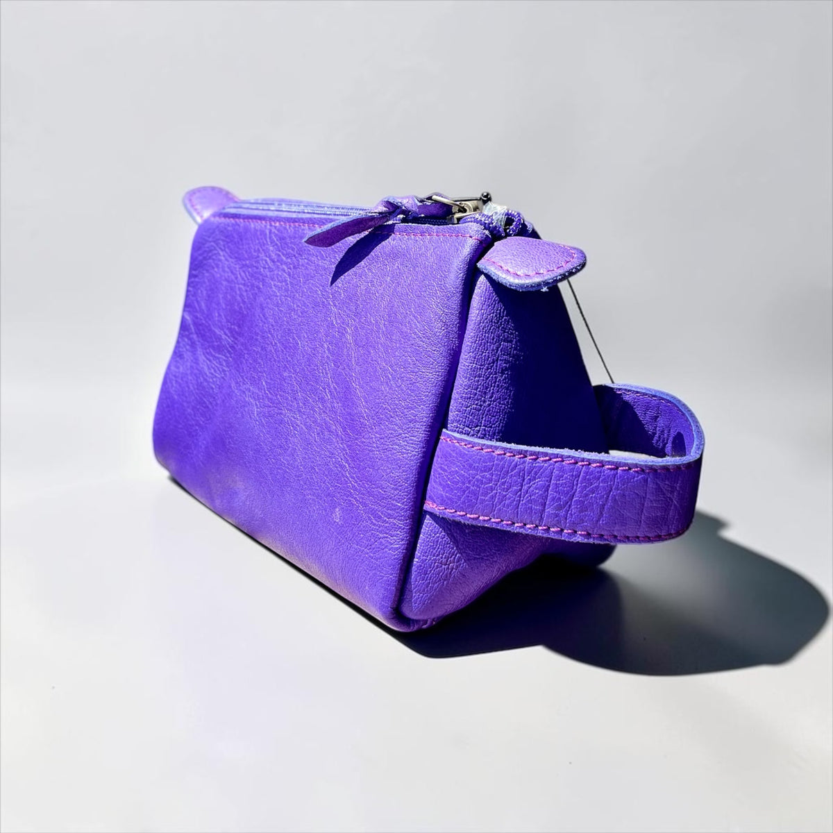 PURPLE BOOTSTITCH TOILETRY BAG