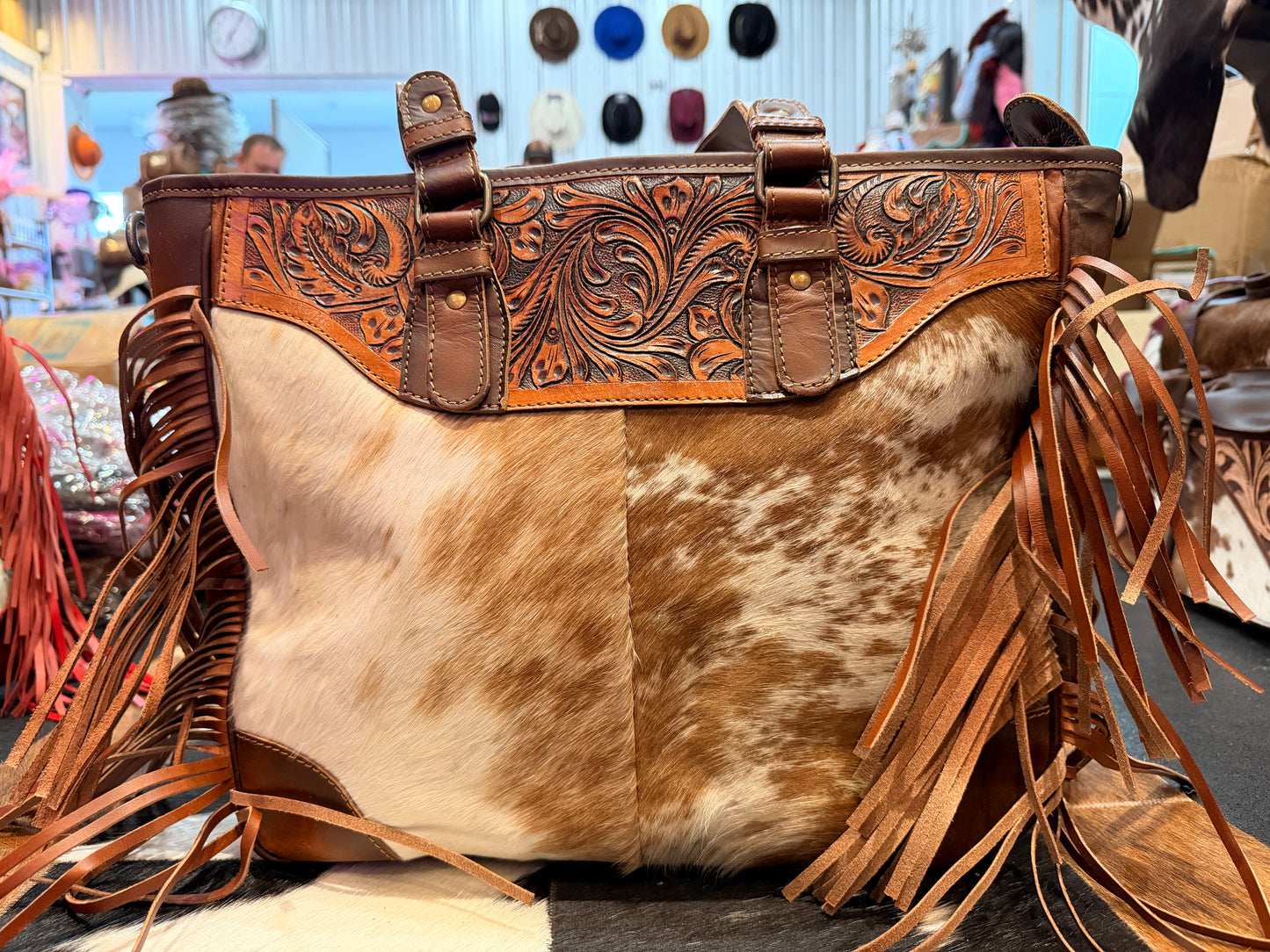 Handcrafted Western cowhide and tooled leather fringe tote bag