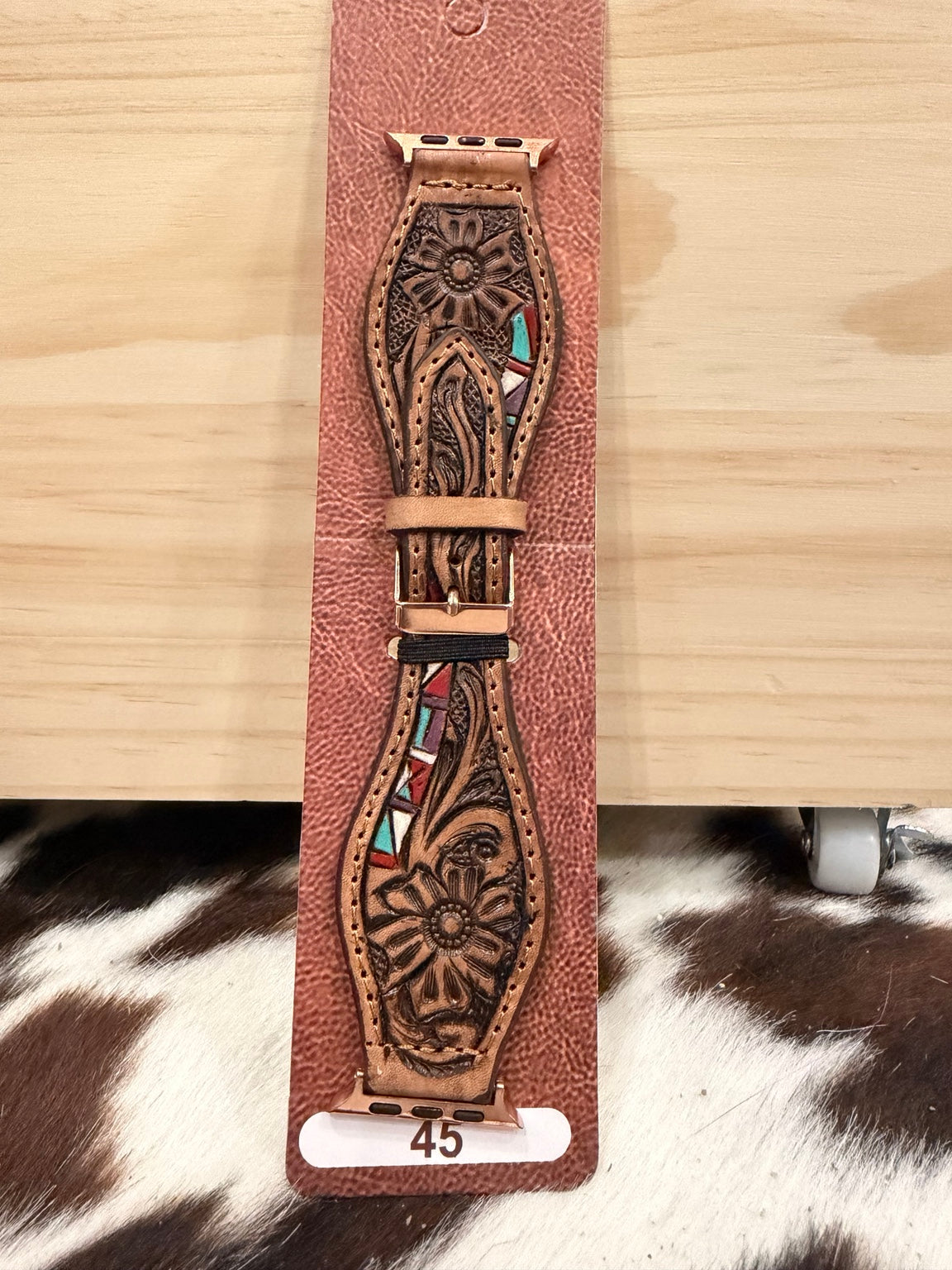 Brown floral tooled 45 mm watch band with multicolor geometric accents