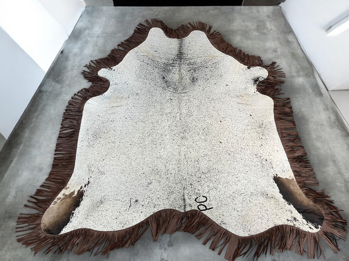 Brown Fringe Cowhide Rug