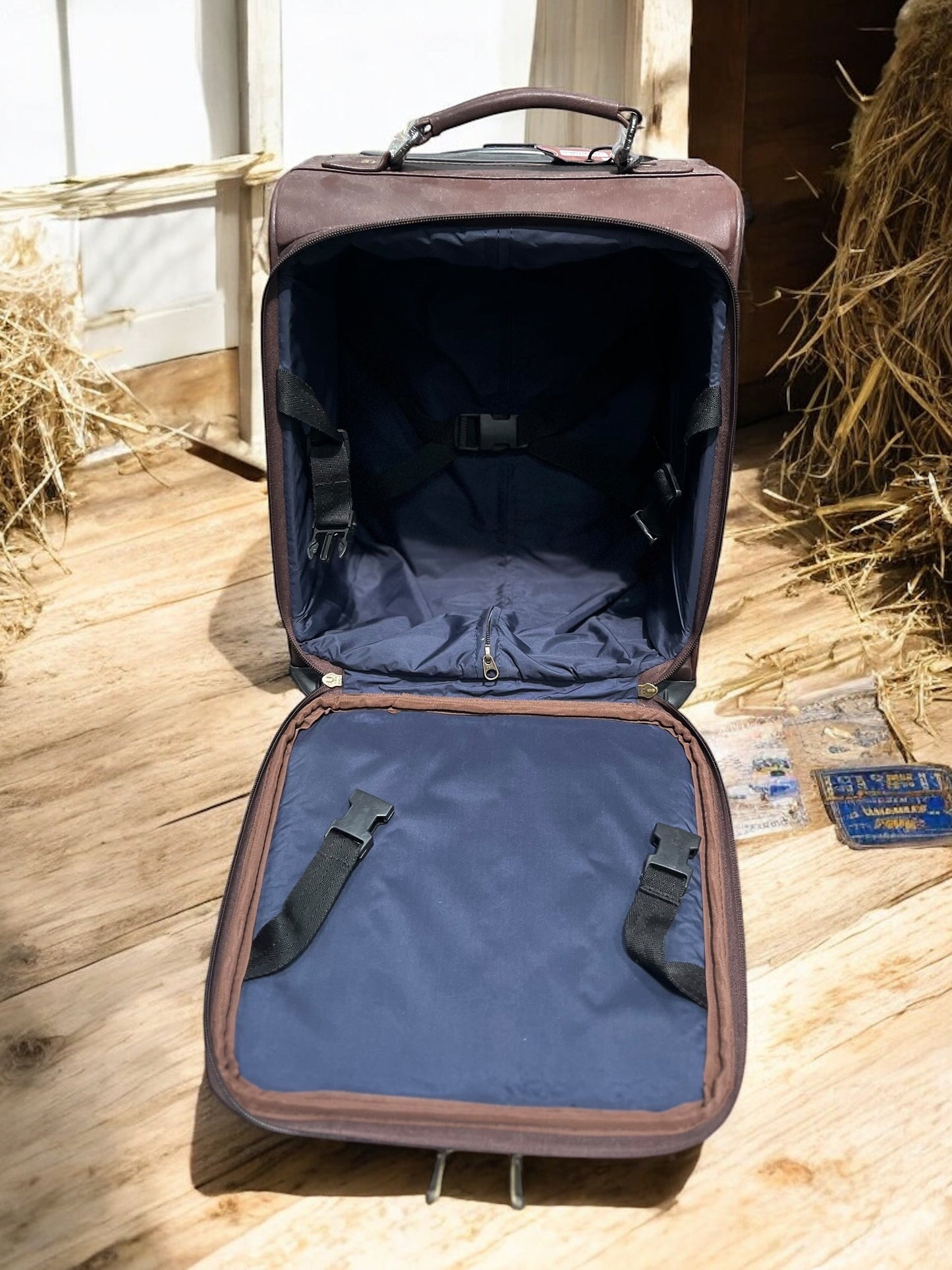 Small Cowhide & Tooled Leather Rolling Suitcase