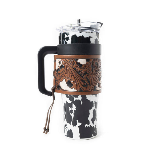 Myra Wide Wyoming Tumbler in black and white with cowhide print and tooled leather design for everyday use