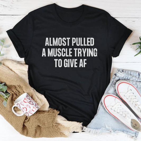 Relatable Effort Humor Crewneck Tee – "Almost Pulled A Muscle Trying To Give AF"