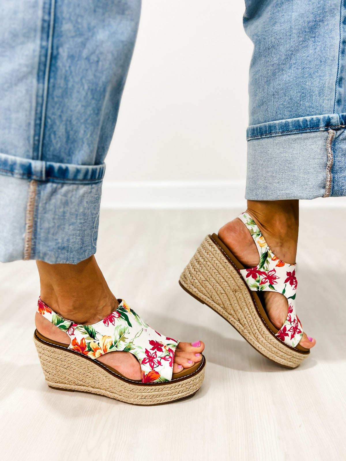 Corkys Freddie white floral wedge sandals pair